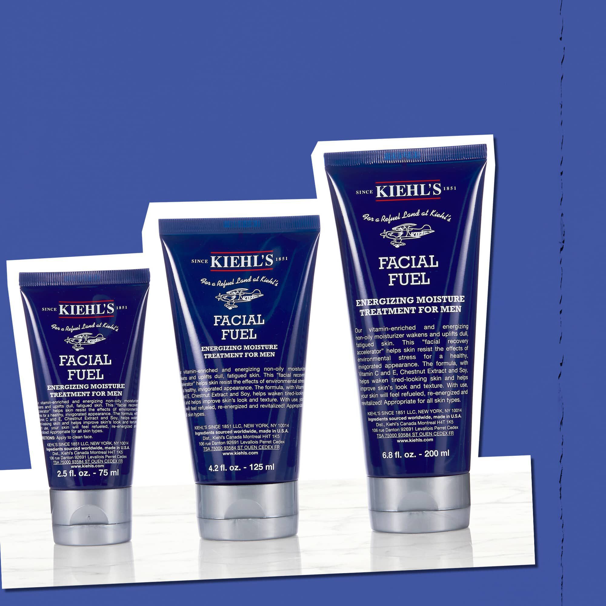 Tri stekleničke energizirajoče vlažilne nege za moške Facial Fuel, ki prikazujejo razpoložljive velikosti