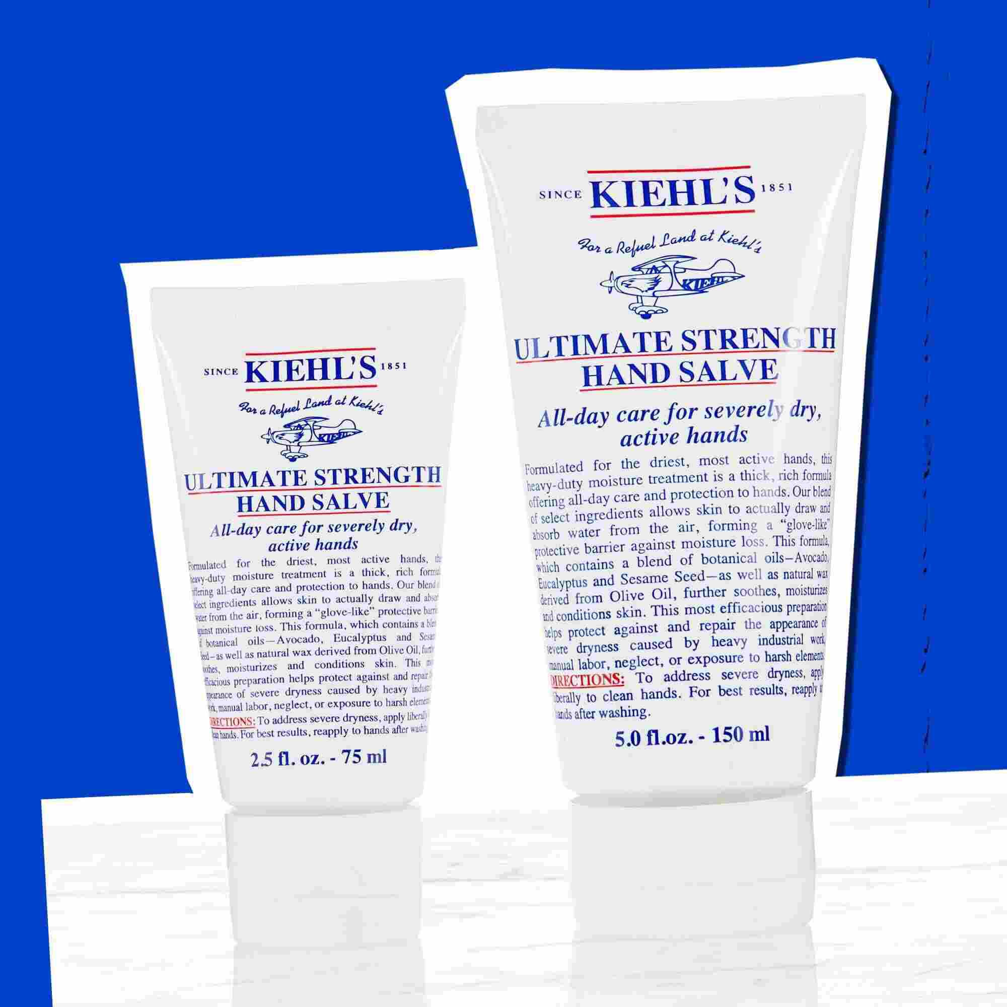 Dve tubi Kiehl's Ultimate Strength Hand Salve, ki prikazujeta razpoložljive velikosti