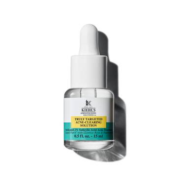 15-mililitrska steklenička Kiehl's Truly-Targeted Blemish-Clearing Solution na belem ozadju.