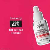 Steklenička Ultra Pure 9.8% Glycolic Acid Serum na roza ozadju z besedilom: »Takoj je 83 % občutilo izboljšano teksturo.«