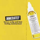 Steklenička Magic Elixir Hair Oil na zlatem ozadju z besedilom: »Takoj navlaži lasišče in lase.«