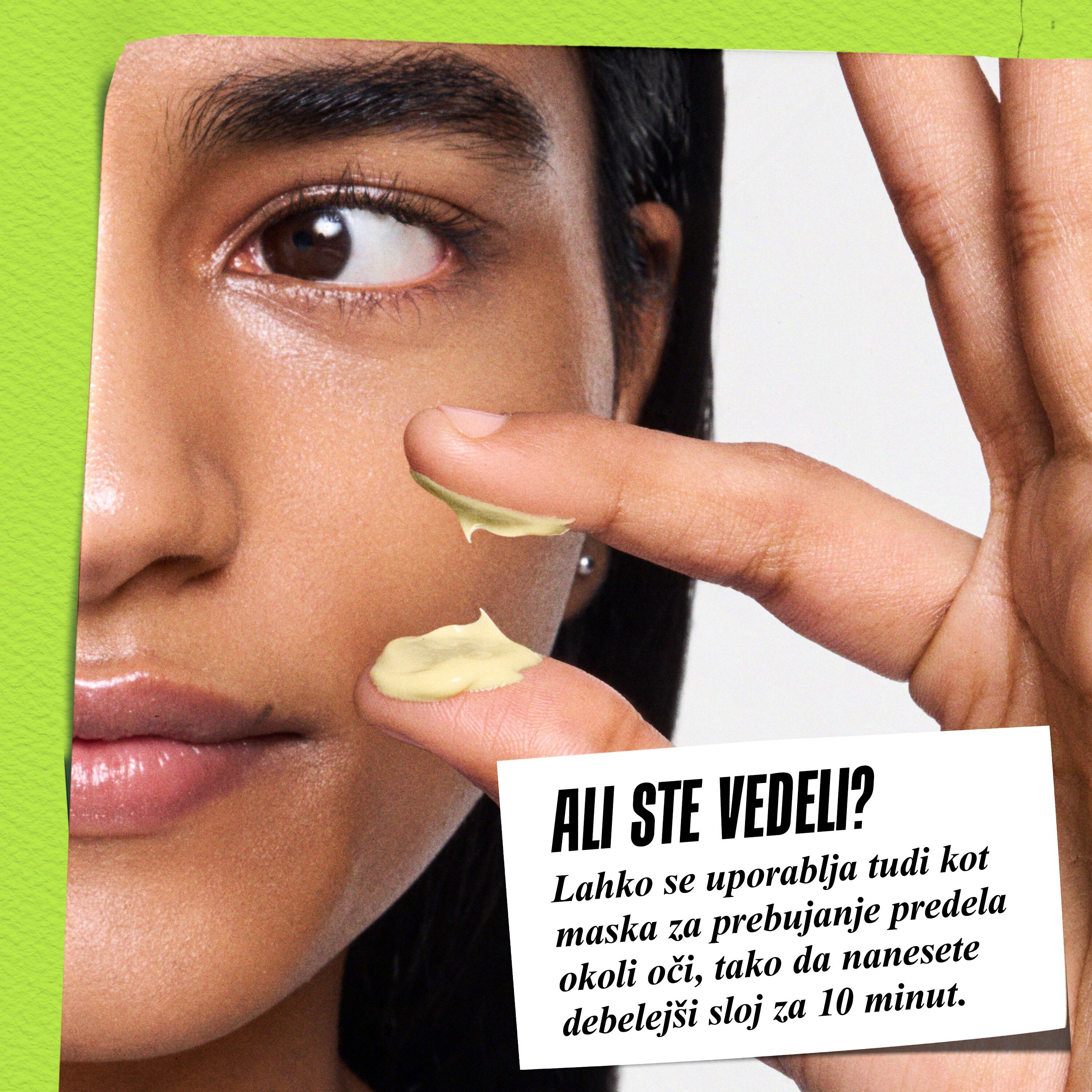 Model drži posodico Kiehl's Creamy Eye Treatment z avokadom