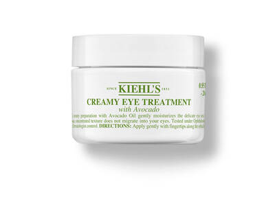 Kiehl's kremna obdelava oči z avokadovim oljem v beli embalaži, namenjena vlaženju občutljive kože okoli oči.